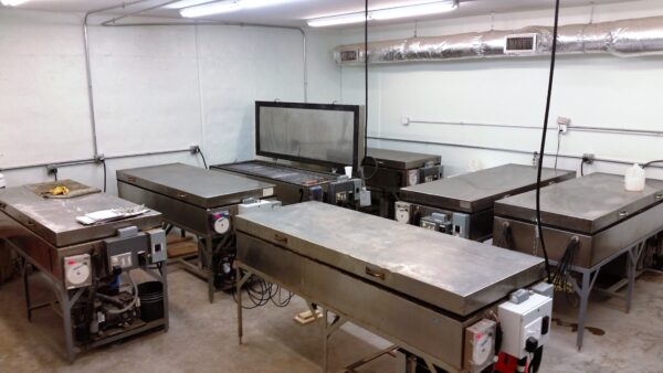 Concrete testing laboratory showing cabinets for freeze-thaw testing